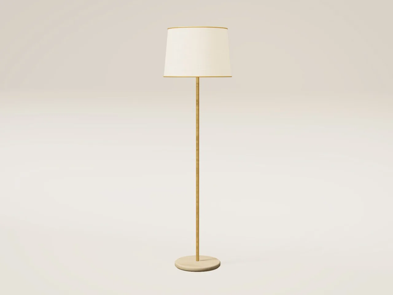 Slim brass floor lamp with linen shade and travertine base